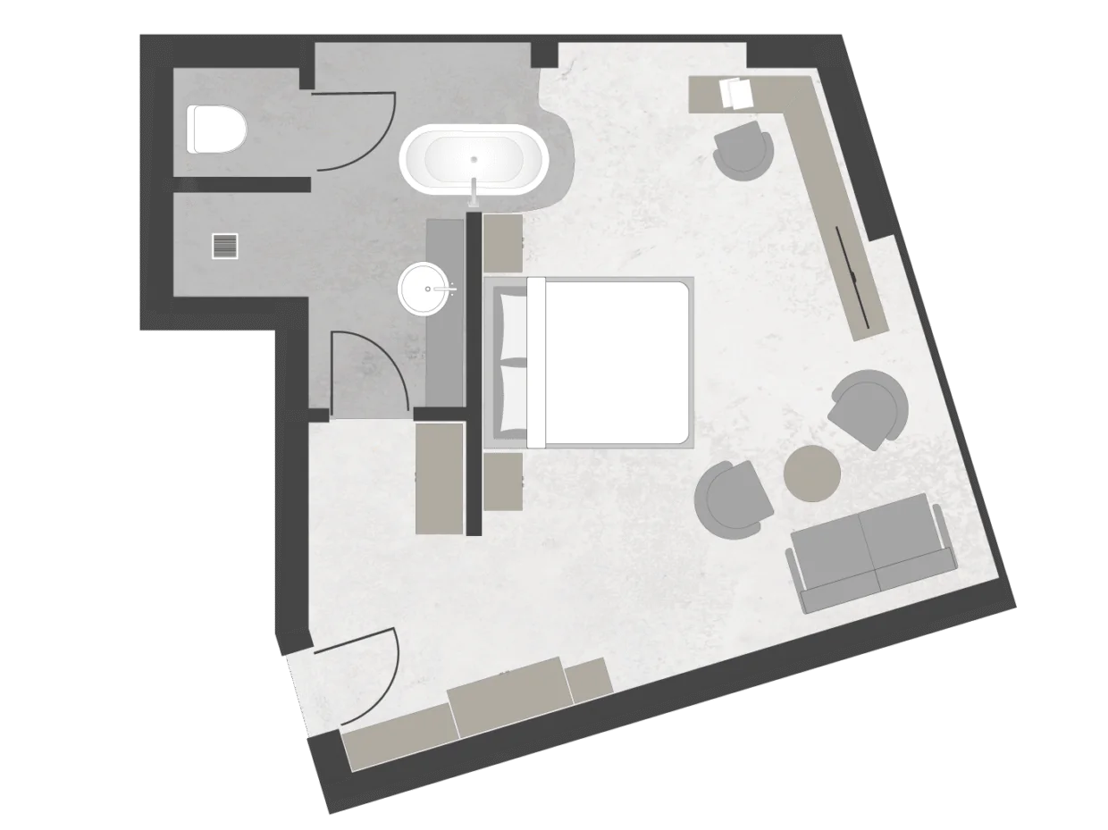Grundriss eines Hotelzimmers mit Bad und Wohnbereich.